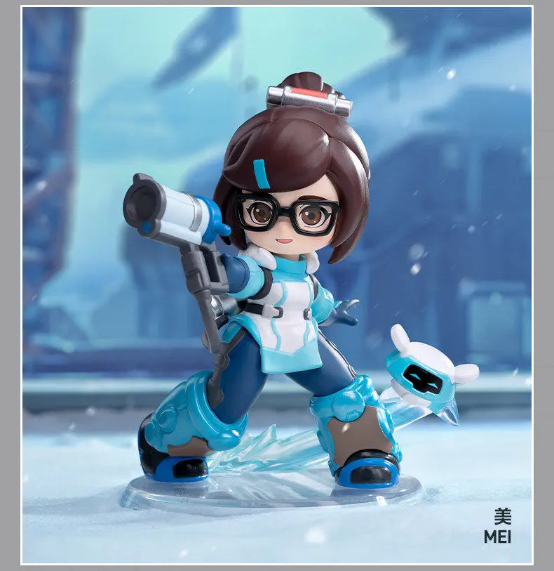 A collectible PVC figurine of a female character in Overwatch attire standing on a clear base.