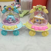 A collectible figure of a doll housed in a clear dome with purple and pink accents, featuring a golden base.