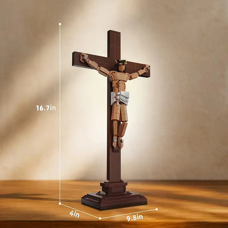 A brown wooden crucifix figure standing on a base, shown against a light background.