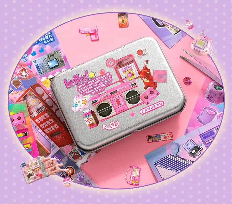 A pink and silver die-cut sticker book set featuring various kawaii themed stickers and accessories arranged on a light pink 