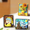 A set of pixel art building blocks depicting sunflowers and other colorful floral designs.