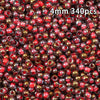 A close-up view of 340 golden gradient glass beads in various shades of red and brown.