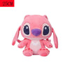 A pink plush figurine of a donkey character with large eyes and purple accents.
