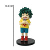 Chibi PVC figure of Izuku Midoriya from My Hero Academia, featuring green hair and yellow clothing.