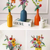 A collection of colorful floral bouquets displayed in various ceramic vases and set against a white background.