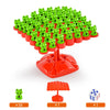 A red base supports a green frog balance tree with many small green frogs on the branches.