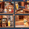 A collection of DIY wooden book nook building kits featuring miniature scenes, food items, and animal figures.