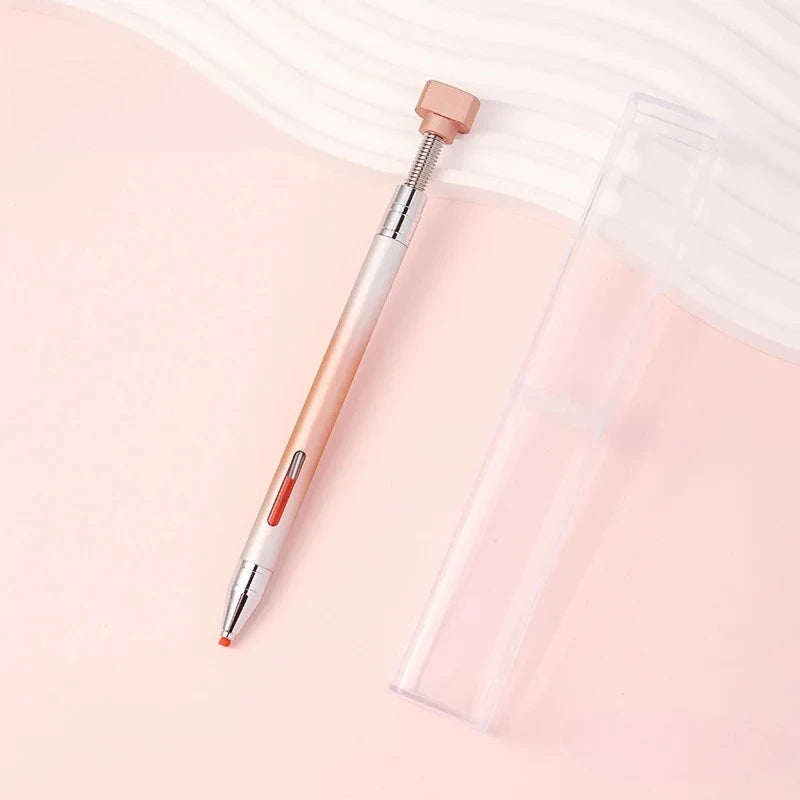 A long, slender pen with a gradient body and a rose gold rotating wax tip is shown next to a clear plastic container.