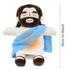 A plush toy depicting a bearded man wrapped in a blue cloth with a soft glow.