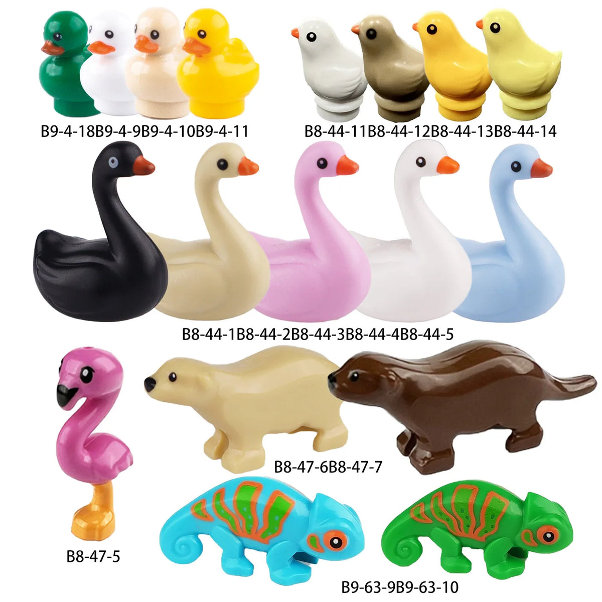 A collection of marine animal building blocks including a black duck, pink swan, white whale, yellow duck, and green shark.