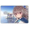 Anime girl with long brown hair looking forward against a blue sky and water background.