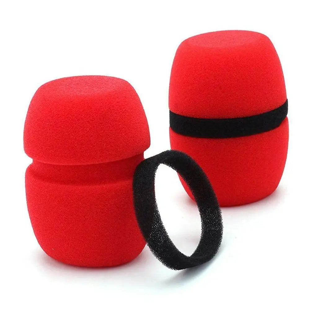 A set of red foam microphone windscreen covers with black bands.