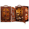 A wooden miniature bookshop memory kit featuring an ornate door and interior display with books and decor.