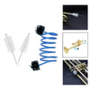 A set of trumpet and cornet cleaning tools including piston and mouthpiece brushes.