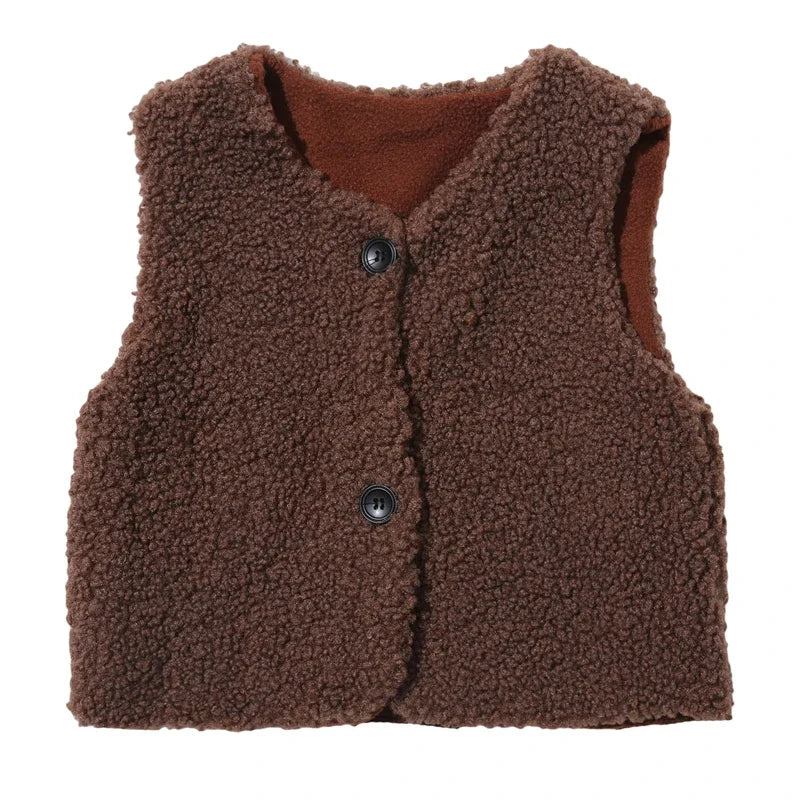 A brown, fuzzy fleece vest for children, designed as a warm and cozy sleeveless jacket.