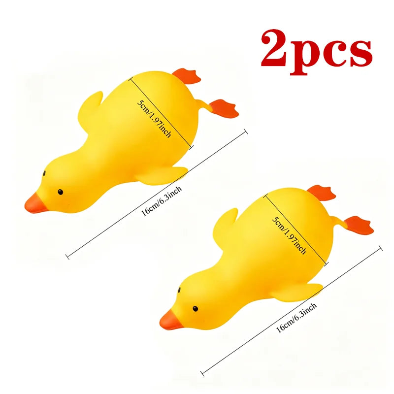 Two yellow duck squishy toys for stress relief and sensory play