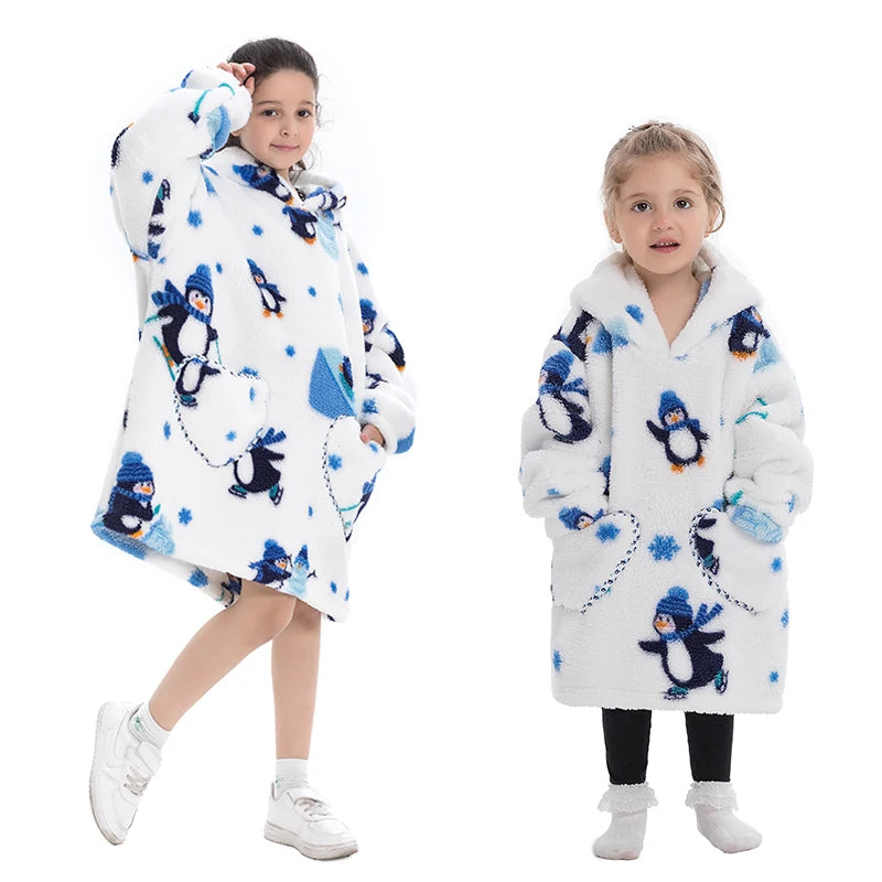A young girl models a white and blue fluffy fleece hoodie sweater for winter.