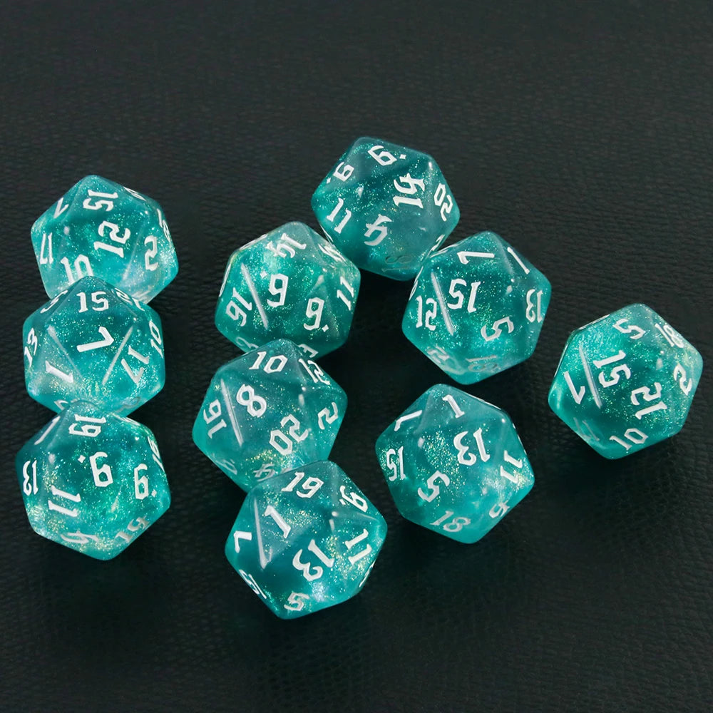 A collection of ten glittery, translucent teal D20 polyhedral dice scattered on a dark surface.