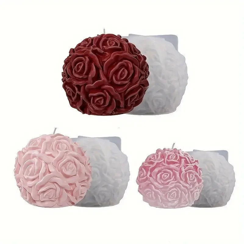 Two silicone molds shaped like rose flower balls in deep red and light pink are shown.