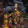 A detailed wooden miniature rail-track city dollhouse kit featuring various buildings and furniture.