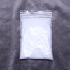 A clear plastic bag filled with white artificial snow powder.