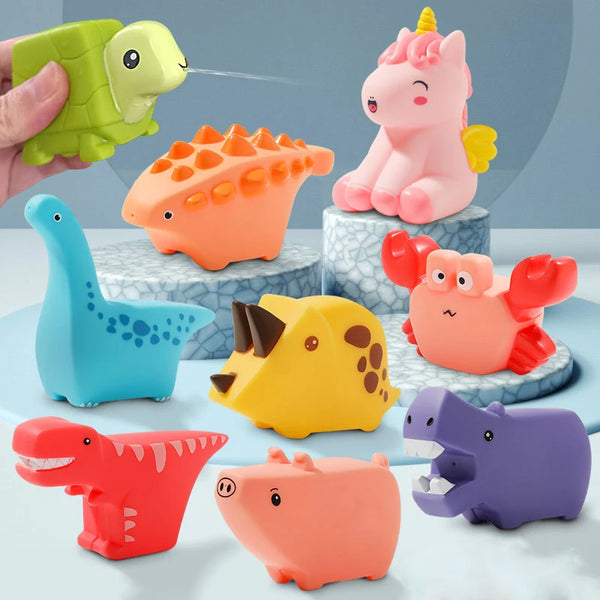 A collection of colorful dinosaur bath toys including a green toy, a pink toy, an orange toy, a yellow toy, a blue toy, a red