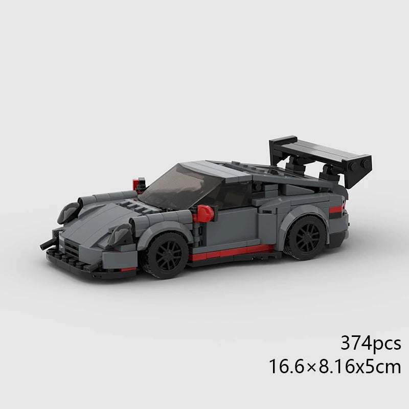 A gray classic rally car building block set with a black roof and wheels.