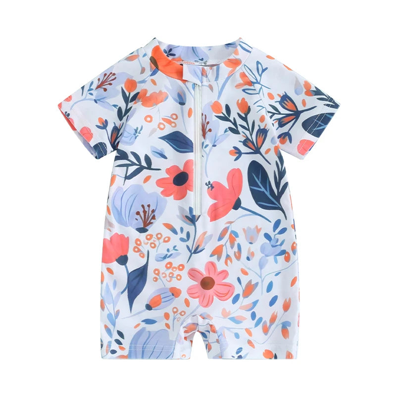 A baby rash guard swimsuit with short sleeves featuring a floral print in white, blue, and orange tones.