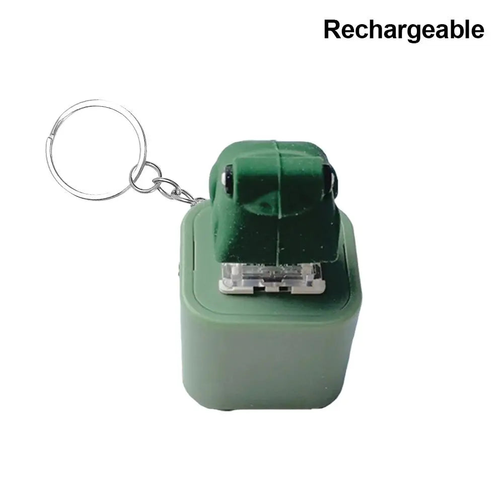 A green rechargeable LED frog croaking keychain fidget toy attached to a metal ring.
