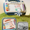 A sliding magic wipe drawing board for kids in blue and white, shown with a cleaning wipe and a storage case.