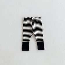 Black and white striped baby leggings with a solid black cuff design