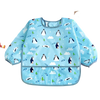 Light blue full-sleeve waterproof baby bib featuring a cute cartoon design of penguins and clouds.