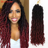 A woman shows off long, reddish-brown goddess faux locs crochet hair extensions with a curly ombre texture.