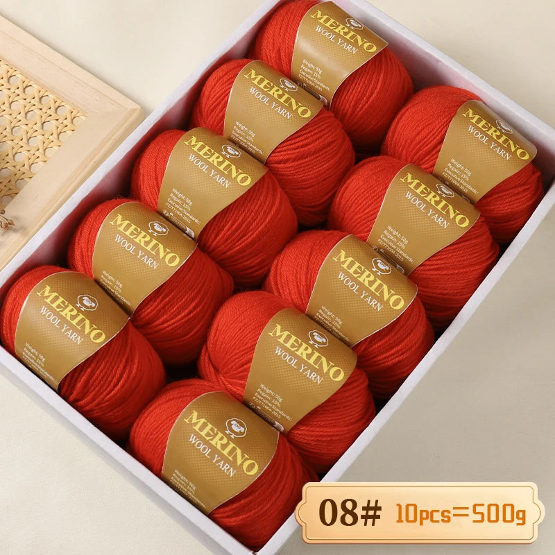 A box of Merino wool yarn balls in a terracotta orange color, packaged for knitting projects.