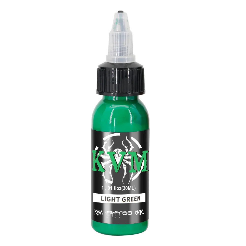 A green bottle of KVM Light Green tattoo ink with a dropper top.
