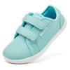 A light mint green kids barefoot sneaker with double hook-and-loop straps shown from the side.