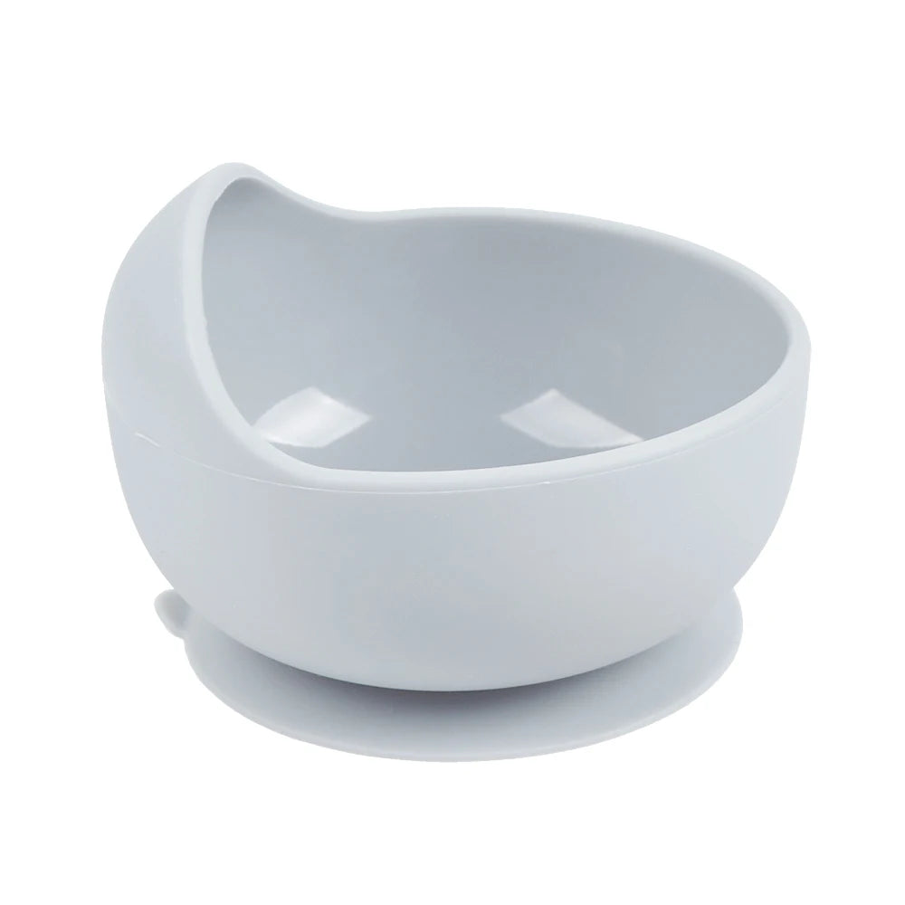 Bol à manger et assiette en silicone blanc assortis pour tout-petits.