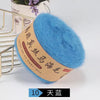 A ball of bright blue silk mohair blended yarn for knitting shawls and sweaters.