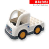 A white toy truck and trailer made of building blocks for children.