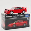 A red Tomica Toyota MR2 (SW20) die-cast sports car model in its packaging.
