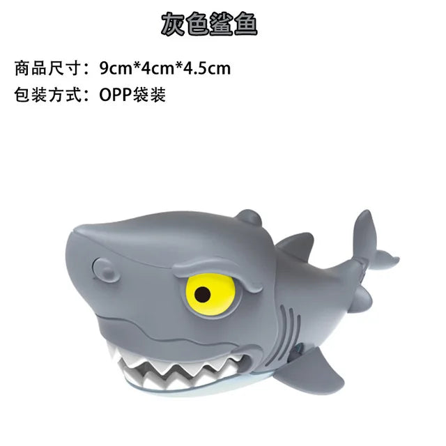 A gray plastic dinosaur figure with a fierce expression and yellow eyes, designed as a fidget toy.