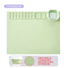 Light green silicone painting mat set with a watercolor palette and cleaning instructions