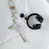 Silver beaded wing cross phone lanyard keychain with a black charm