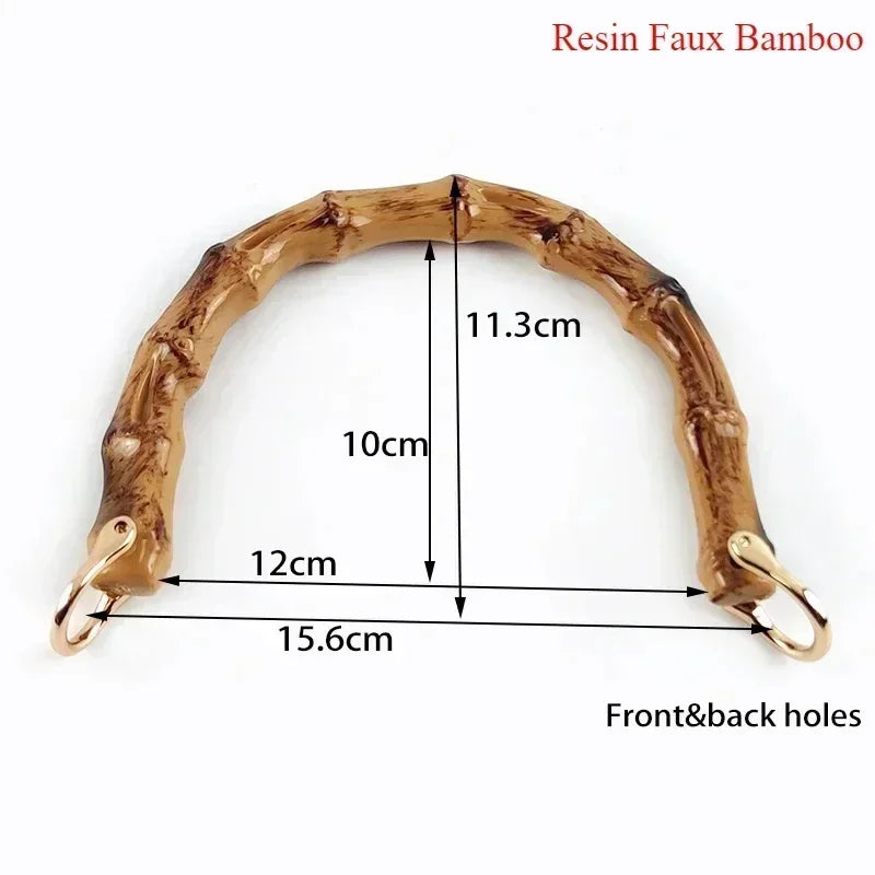 A curved resin faux bamboo handle with front and back holes for DIY bag projects.
