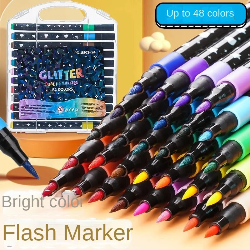 A set of dual tip glitter markers in various colors is displayed next to a packaging box.