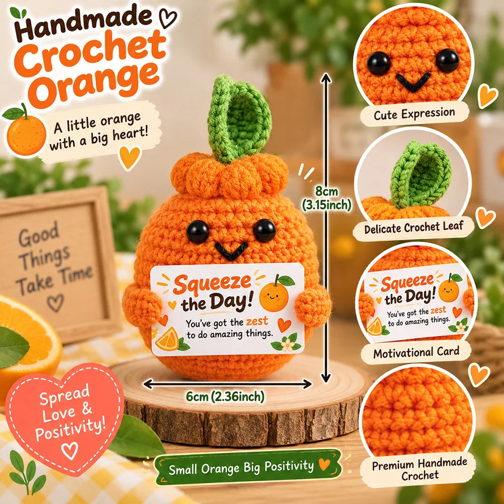 Handmade crochet orange doll with a squeeze the day motivational card and a delicate leaf