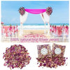 A pile of dried purple and pink rose petals used as confetti for weddings and celebrations.