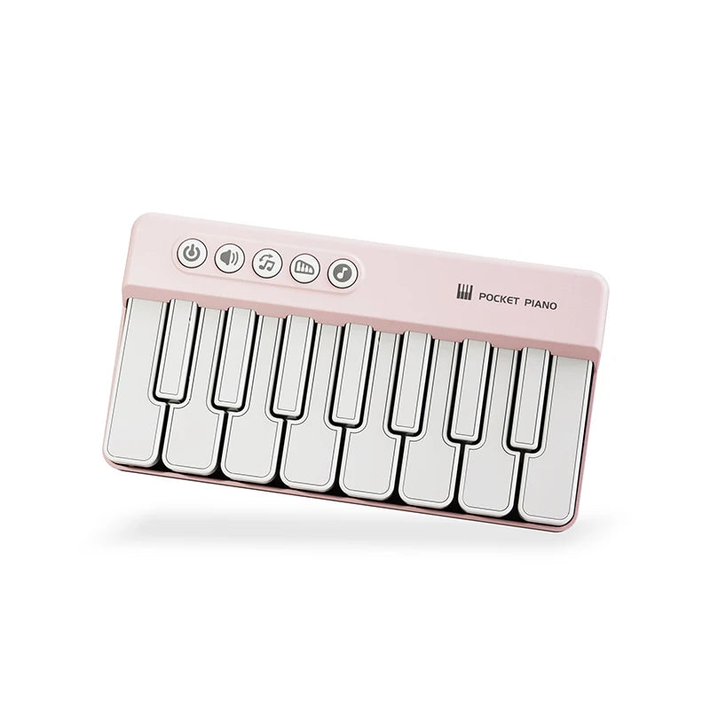 A pink mini piano with white keys and LED controls is shown from the side.