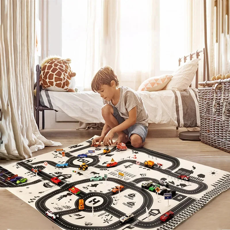 A boy plays with a kids city road map play mat featuring various toy cars indoors.