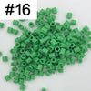 A pile of 1000 green DIY fuse beads, 5mm in size, for creative craft projects.